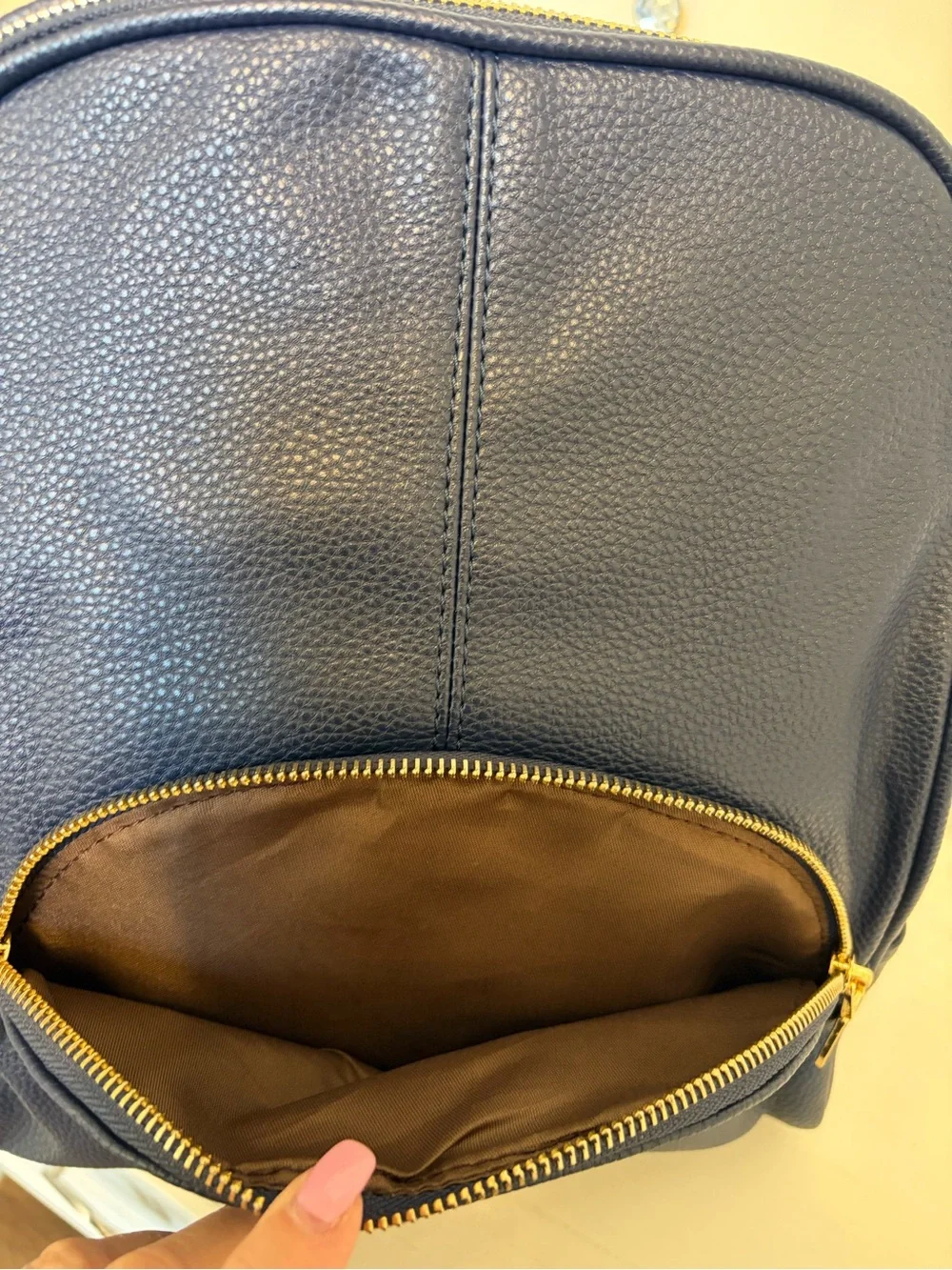 Classic Navy Leather Backpack with Gold Hardware